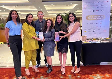 The Pratigya Campaign team holding their Bronze and Silver trophies at the IPRCAA awards