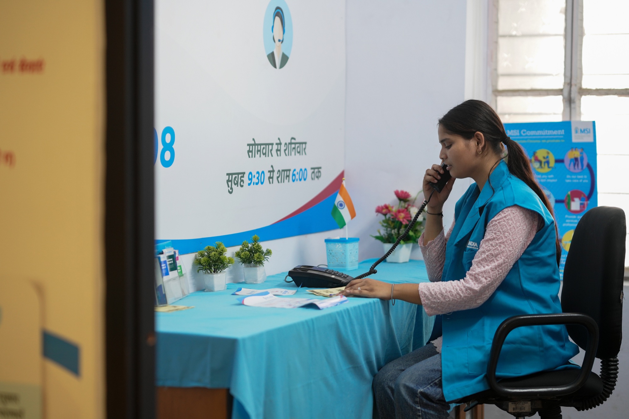 An FRHS India counsellor speaking with a client by phone