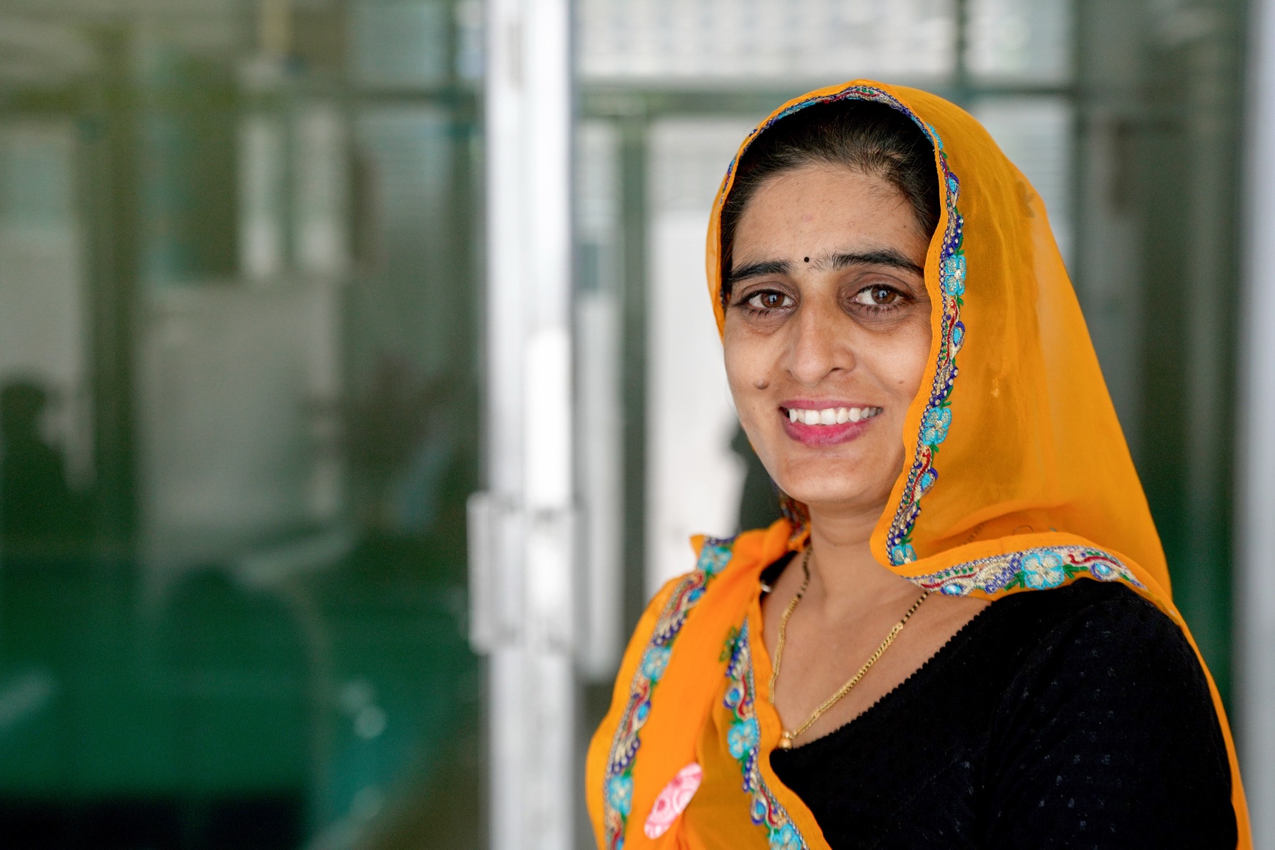 A smiling FRHS India client