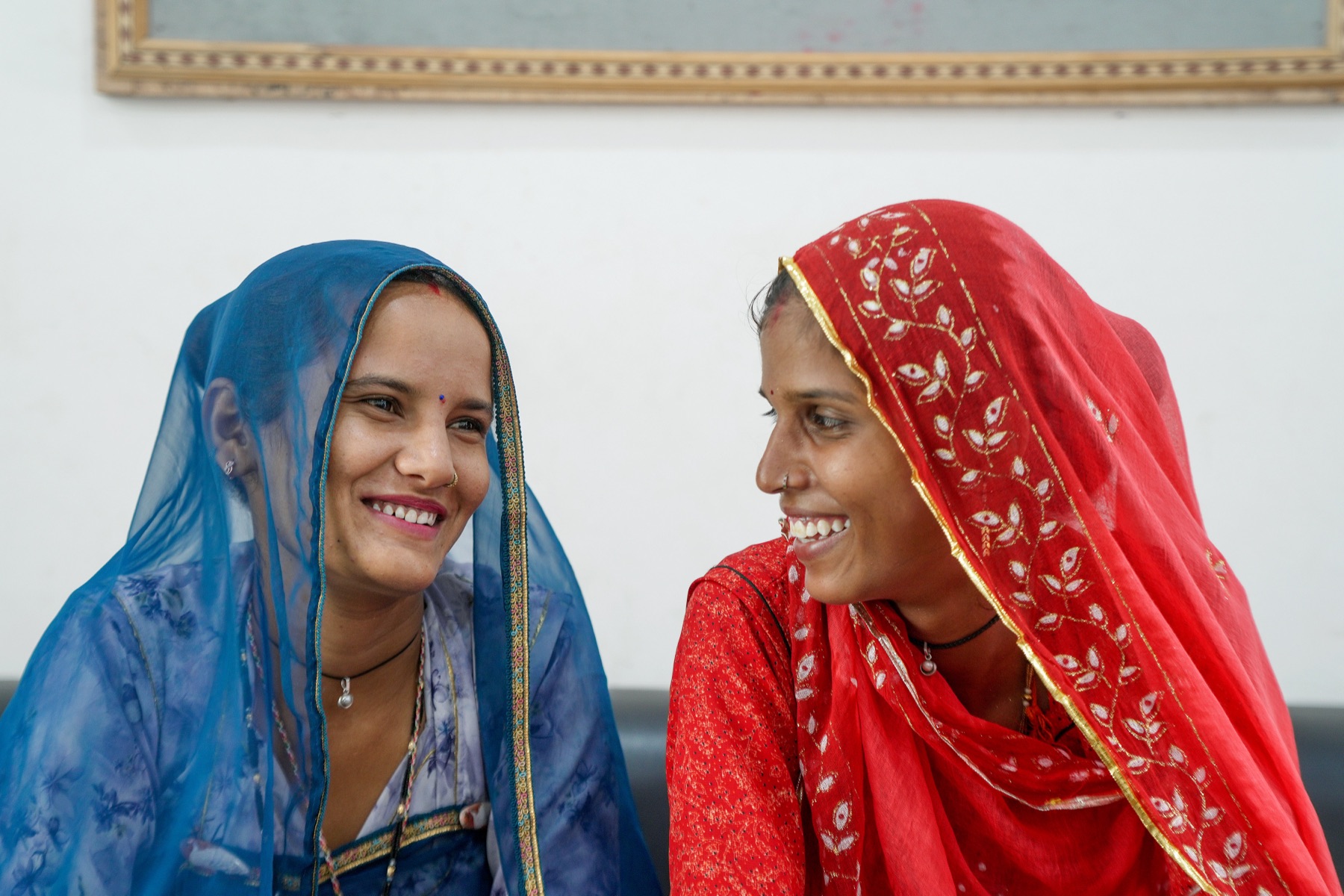Two FRHS India clients laughing together